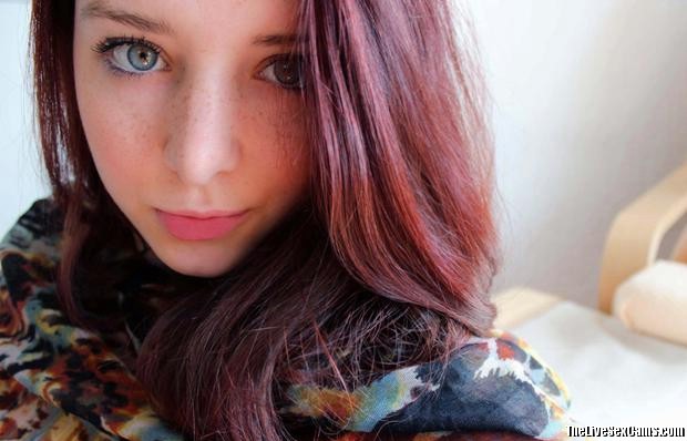 Young redhead with deep eyes